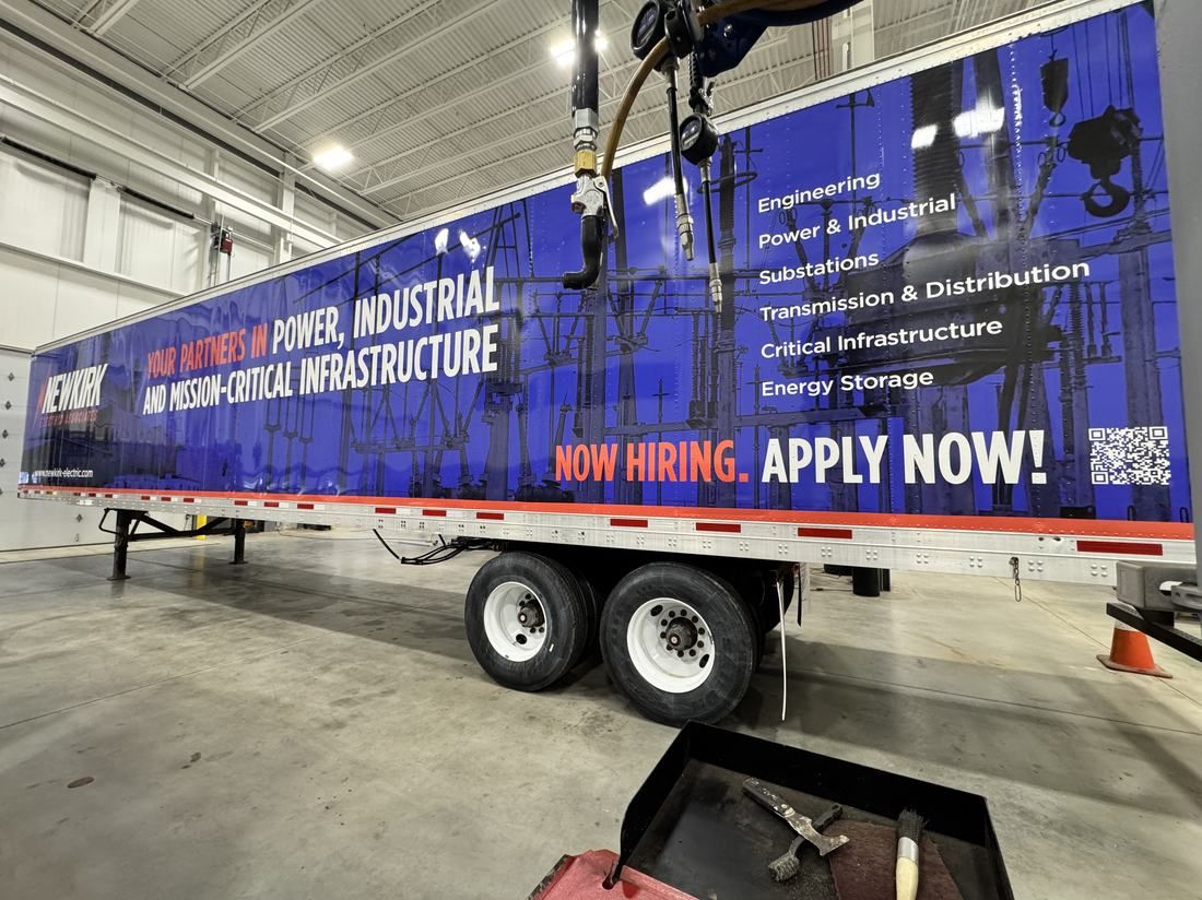 Newkirk Electric Associates trailer signage and lettering installed by Good Graphics Co.