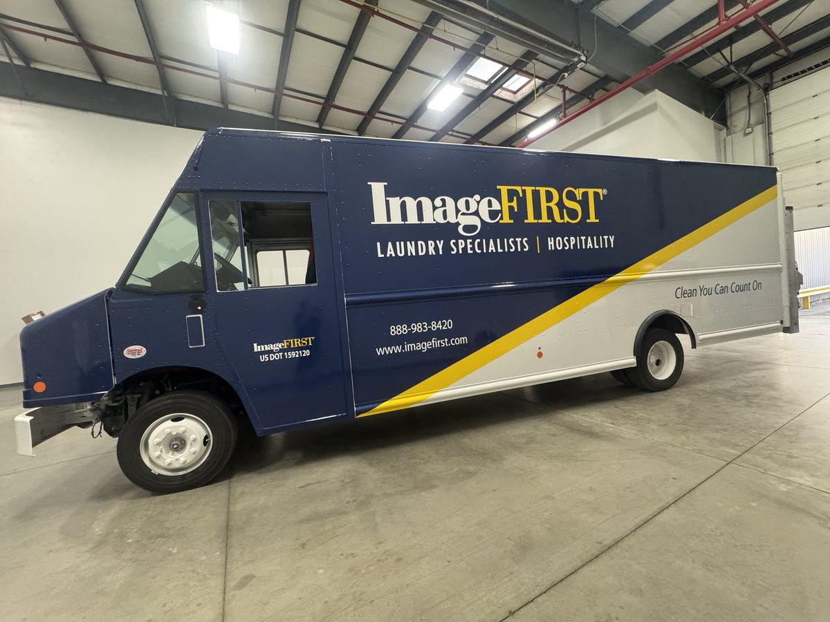 ImageFIRST delivery truck with cut vinyl lettering, logo and DOT numbering installed by Good Graphics Co.